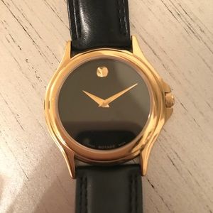 Movado black leather, black and gold face watch