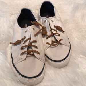 White Sperry sneakers