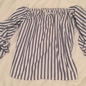 Off the shoulders long sleeve shirt.