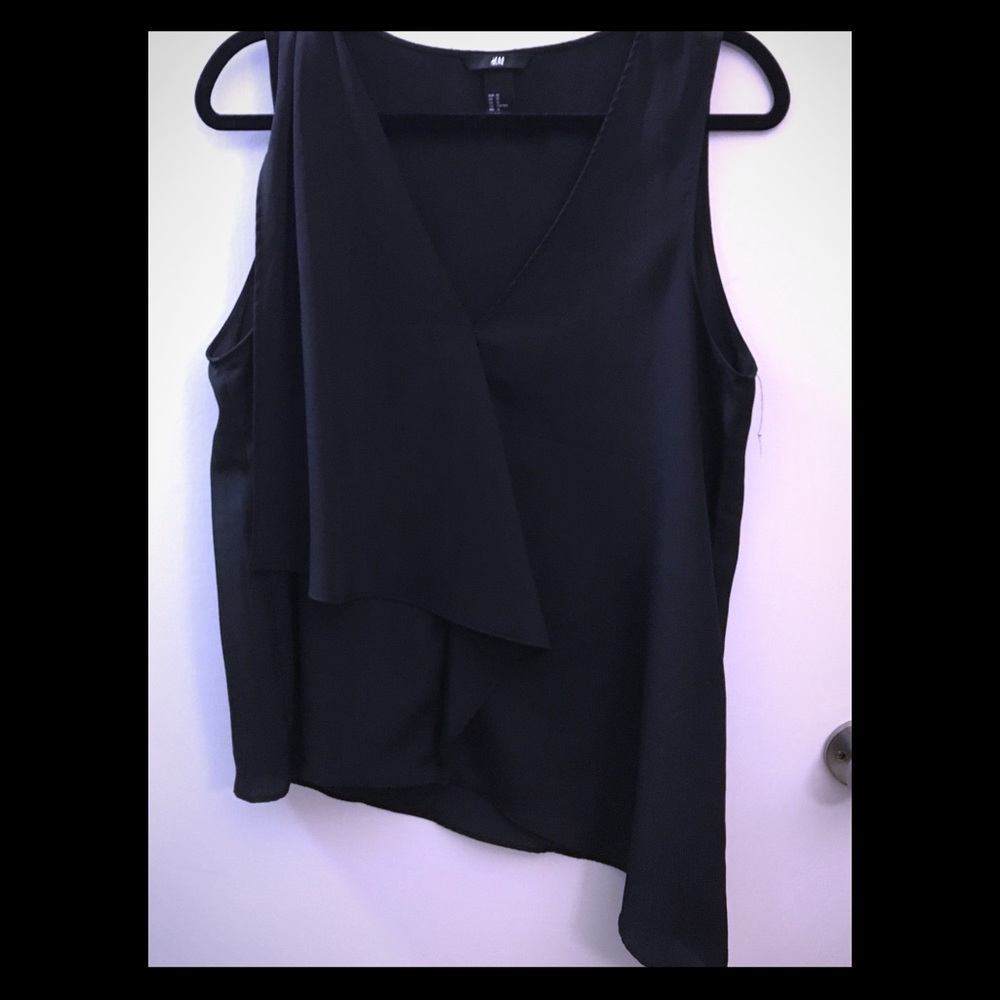 Sleeveless asymmetrical blouse