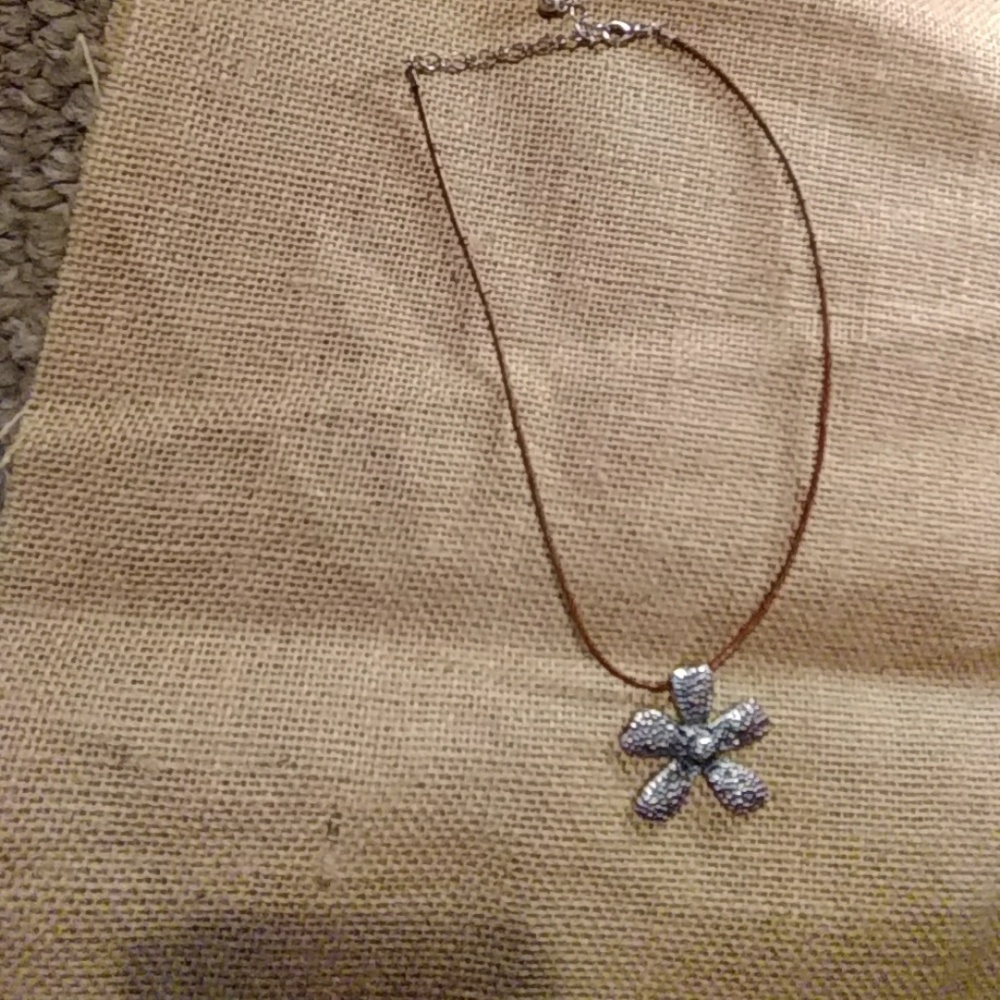 Silpada flower pendant on leather cord