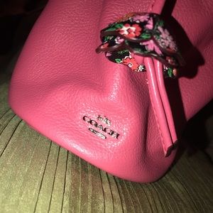 COACH Leather Floral Coated Canvas Petal Wristlet.
