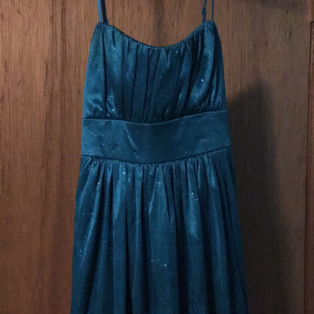 Spaghetti strapped sparkly dark green dress