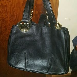 2 mk purses and 1 mk wallet