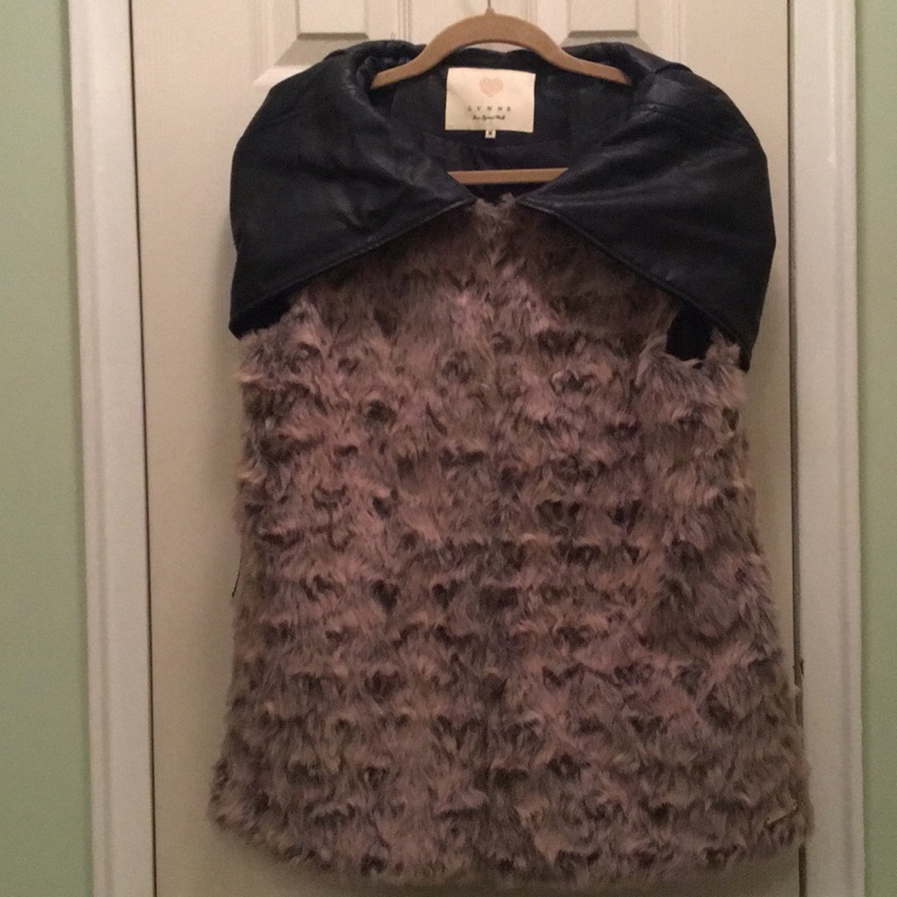 Faux fur vest with faux leather hood