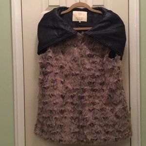 Faux fur vest with faux leather hood