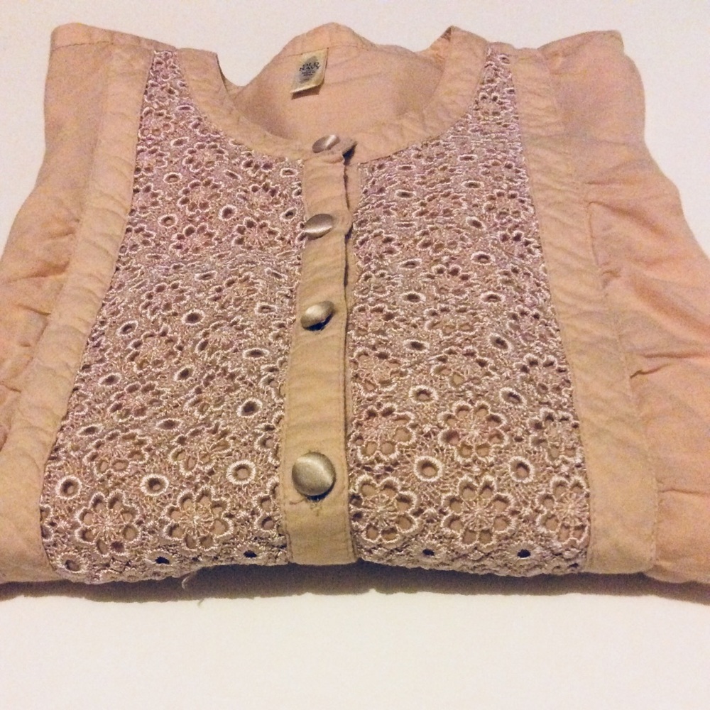 Peach blouse.
