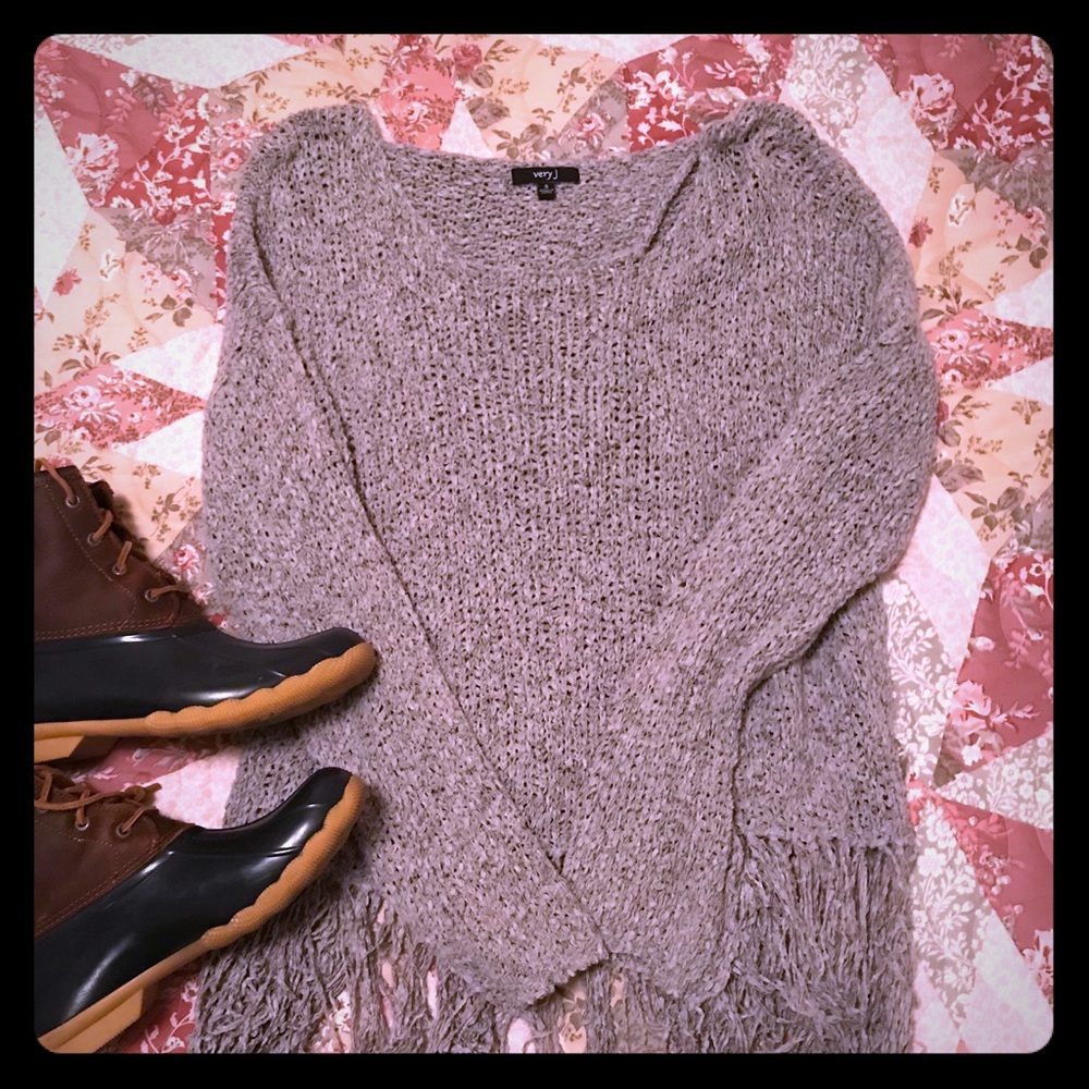Beautiful Boutique shirt with fringe.