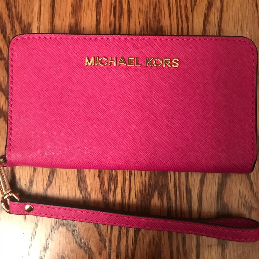 NWT Michael Kors slim tech wristlet.