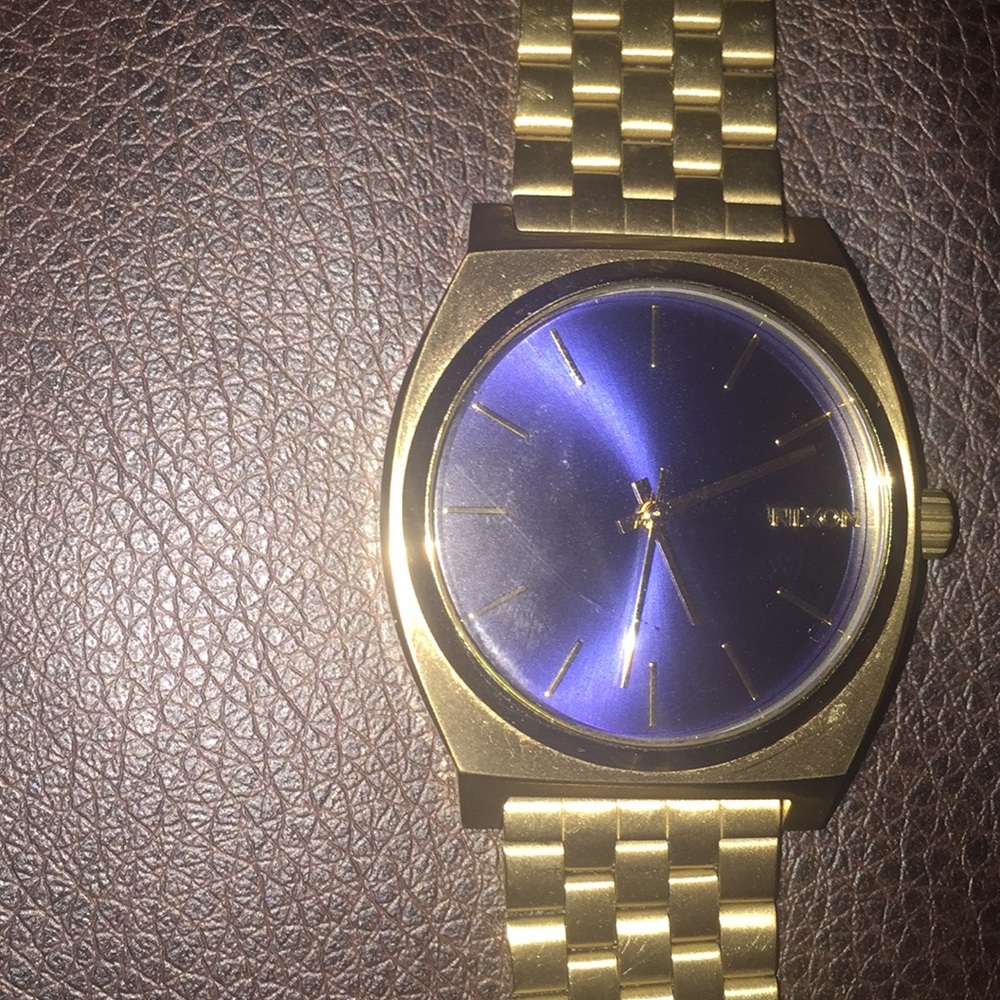 Gold Men’s Nixon Watch