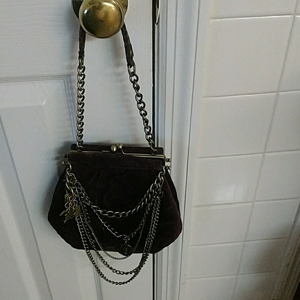 A beautiful wine velour and leather handbag