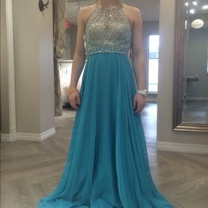 Light blue Prom dress fits size 2-4.