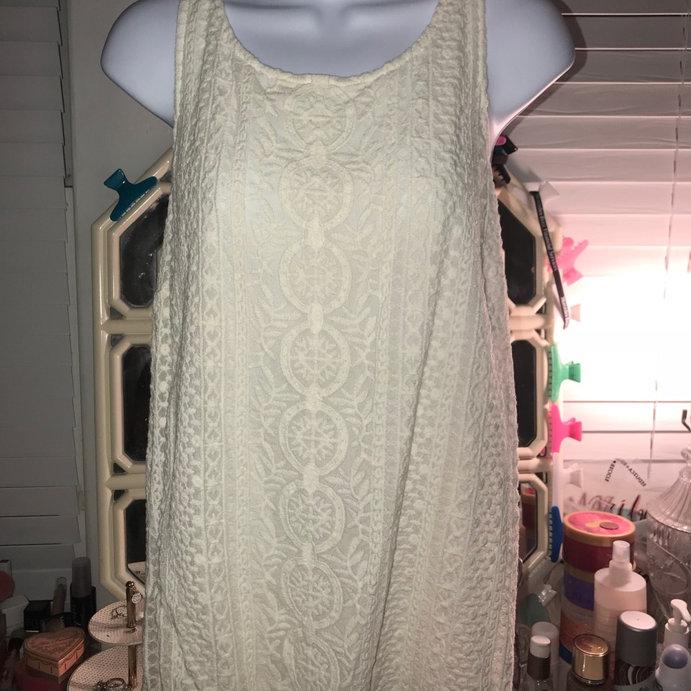 White tank with designs on the front only