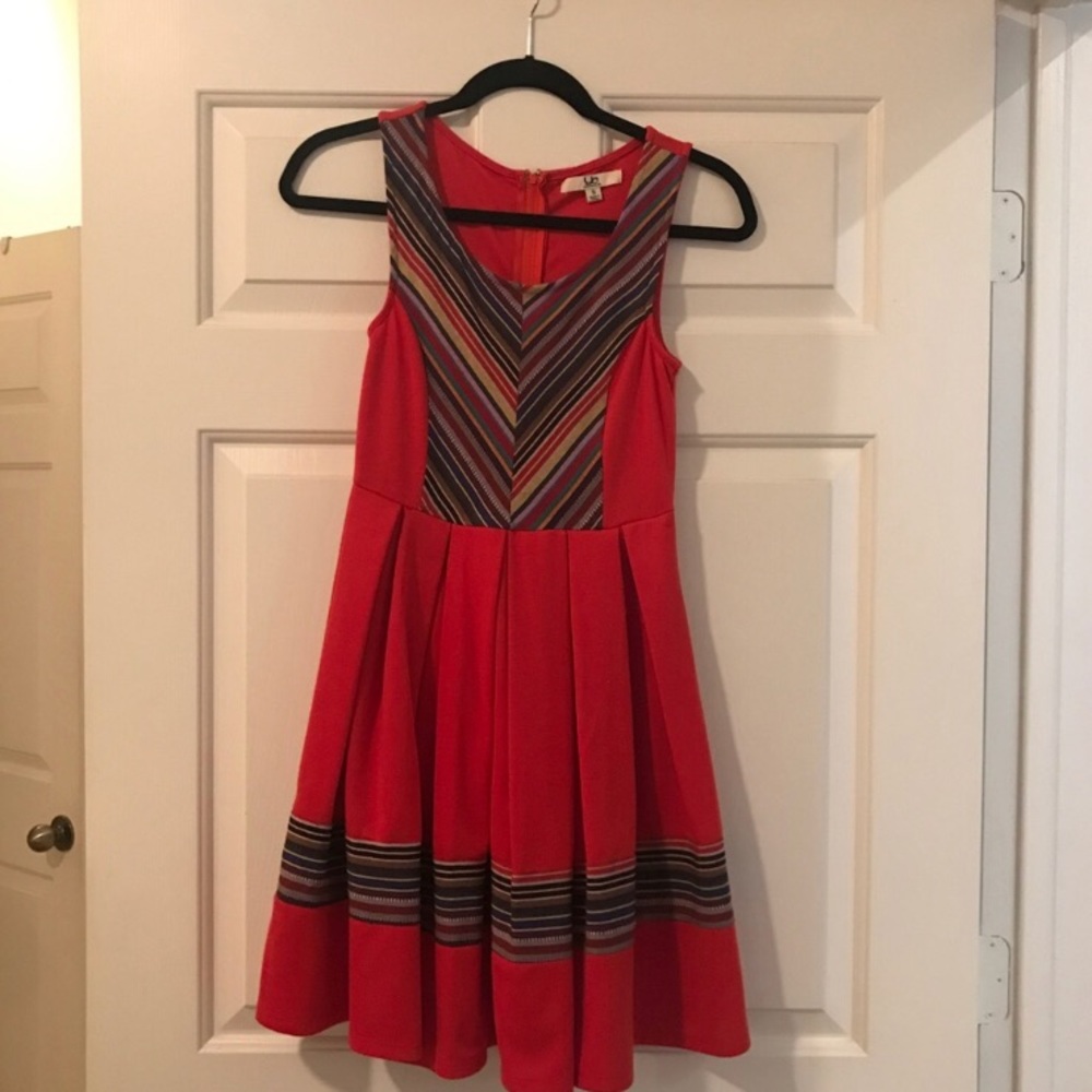 Red Navajo style dress with embroidery details