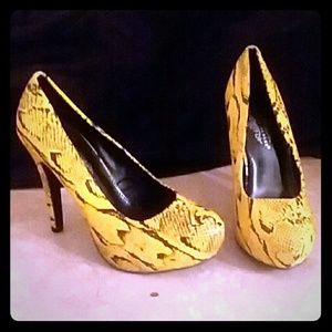 Yellow and black snake skin print platforms