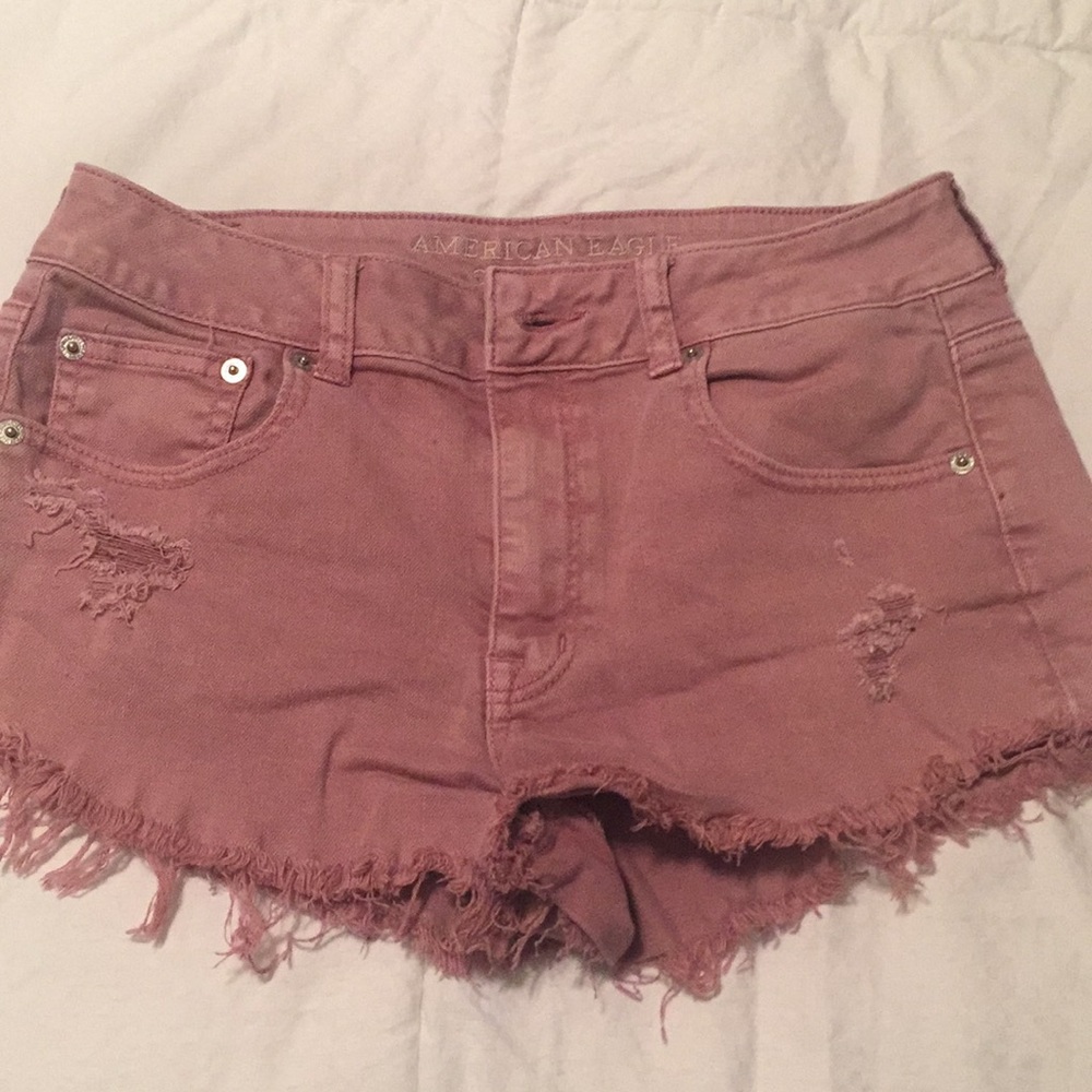 High waisted, pink destroyed jean shorts