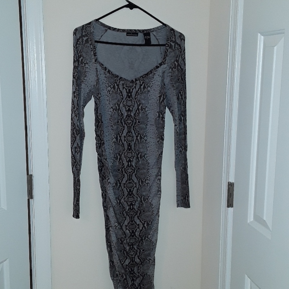Brand new moved Victoria Secrets snake print dress
