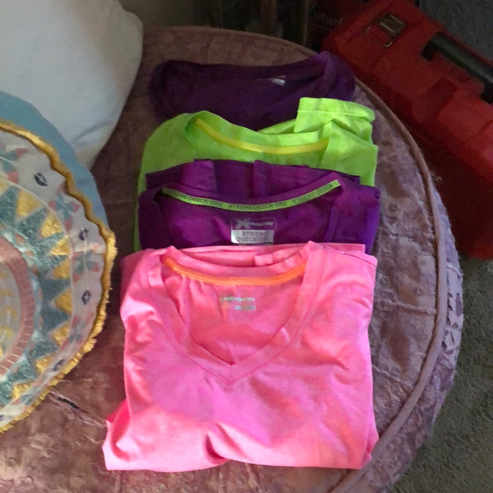 A Bundle of Xersion workout shirts