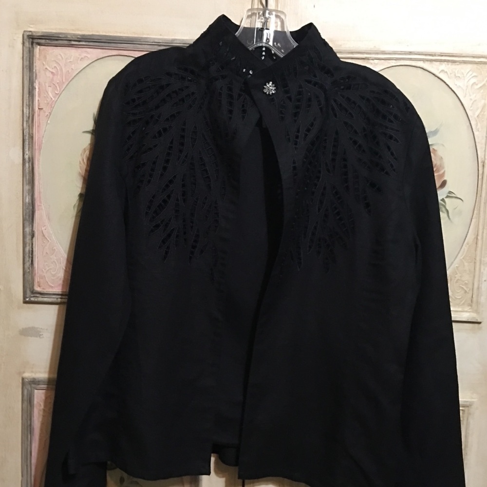Jennifer Eden. Black jacket.