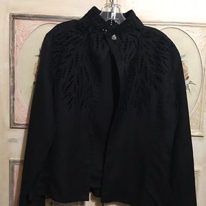 Jennifer Eden. Black jacket.