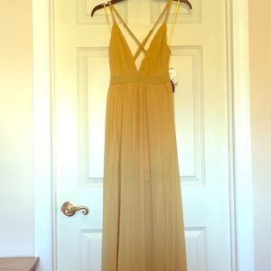 BRAND NEW; tags on. Yellow maxi formal dress