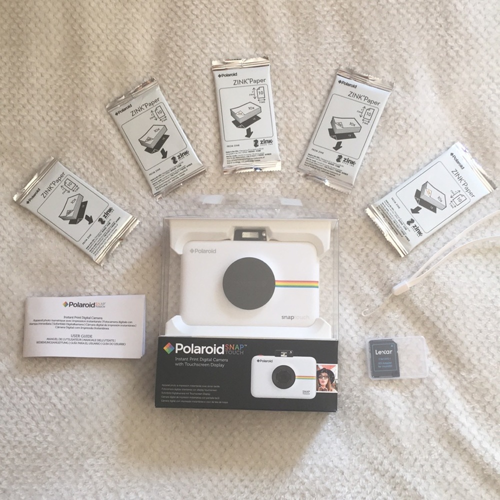 Polaroid Snaptouch Camera with 50 films. Like new.