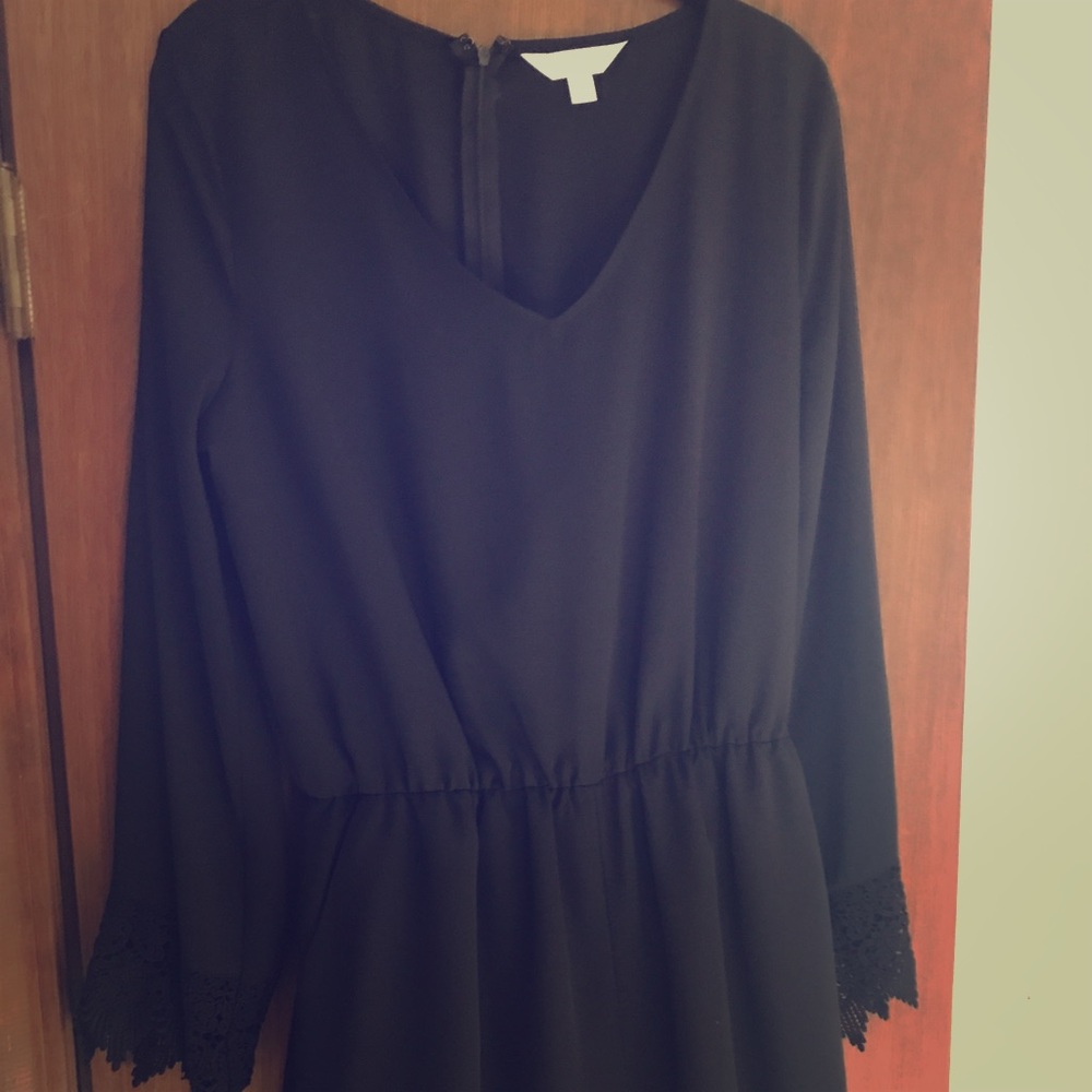 Black romper with sleeve detail