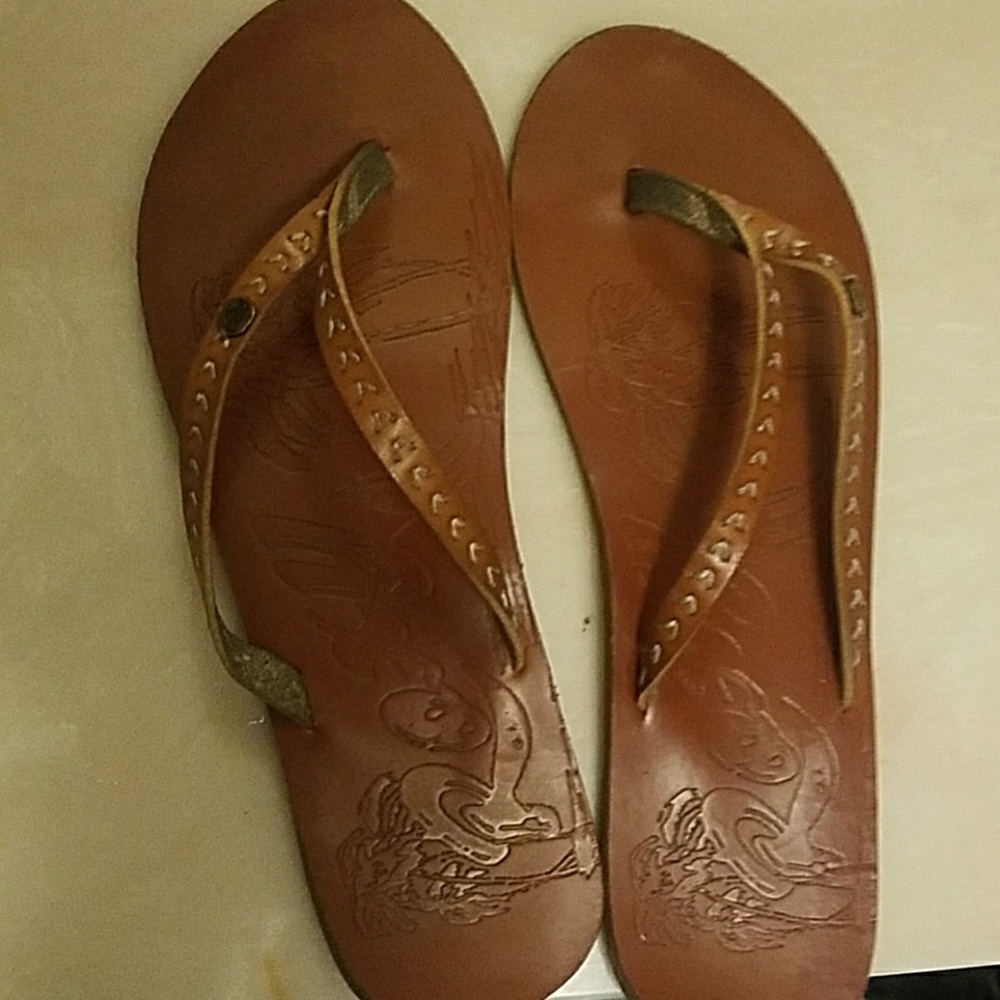 Brown Roxy flip flops