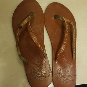 Brown Roxy flip flops