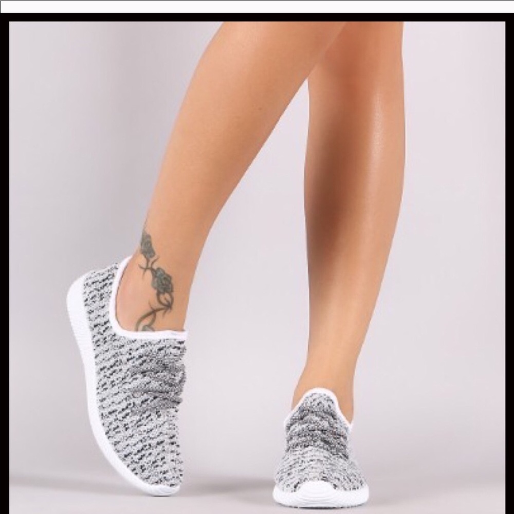 Gray slip on sneakers.