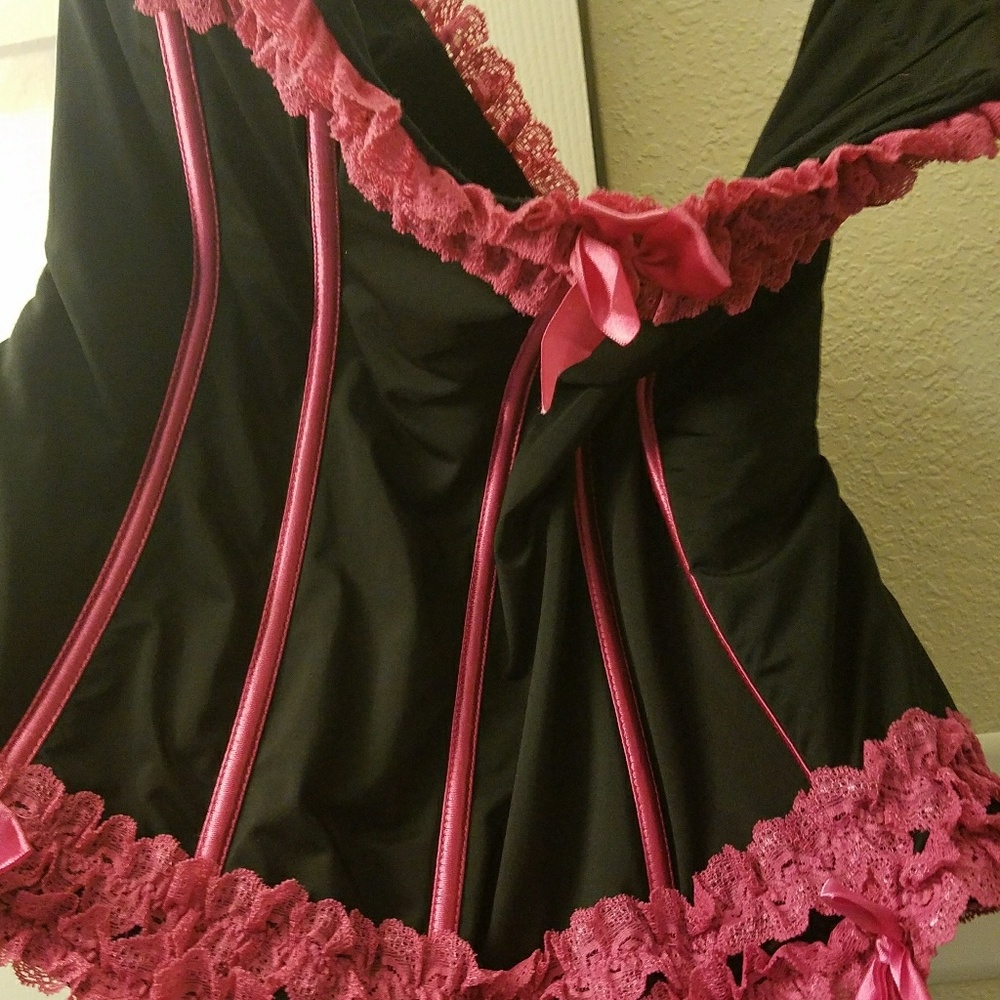 Used pink and black Torrid corset