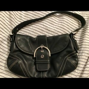 Black Leather Coach-adjustable strap. No frays.