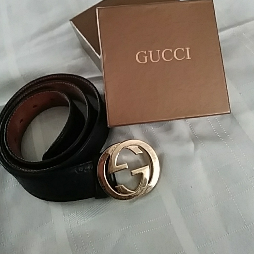 Black and gold leather Gucci belt authentic