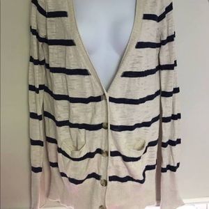 Medium blue and cream colored striped cardigan
