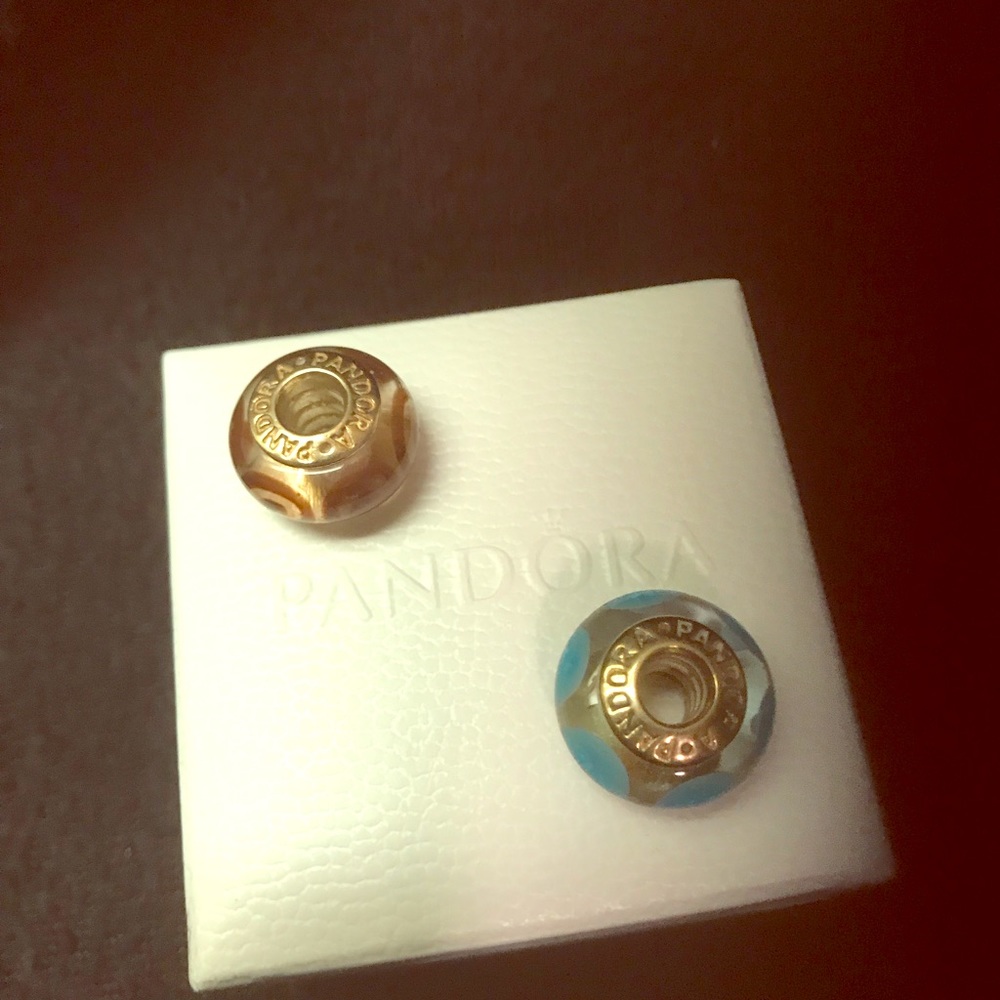 Pandora gold glass charms.