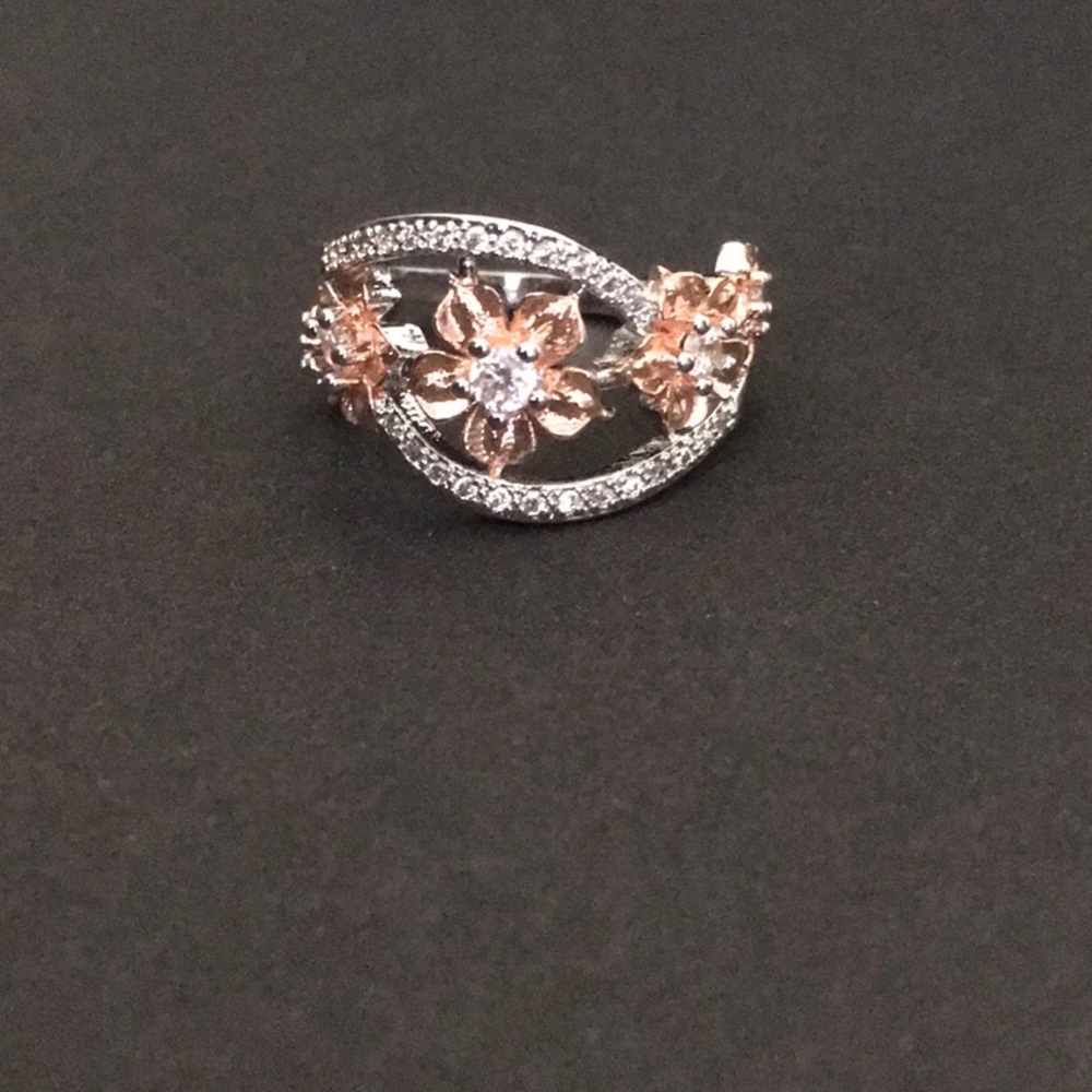 Two tone sterling silver and 18k rose gold ring