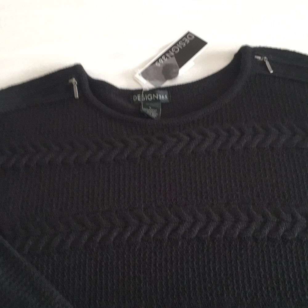 Black cable knit sweater. New with tags. L