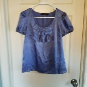 The limited periwinkle color dressy ruffle tee