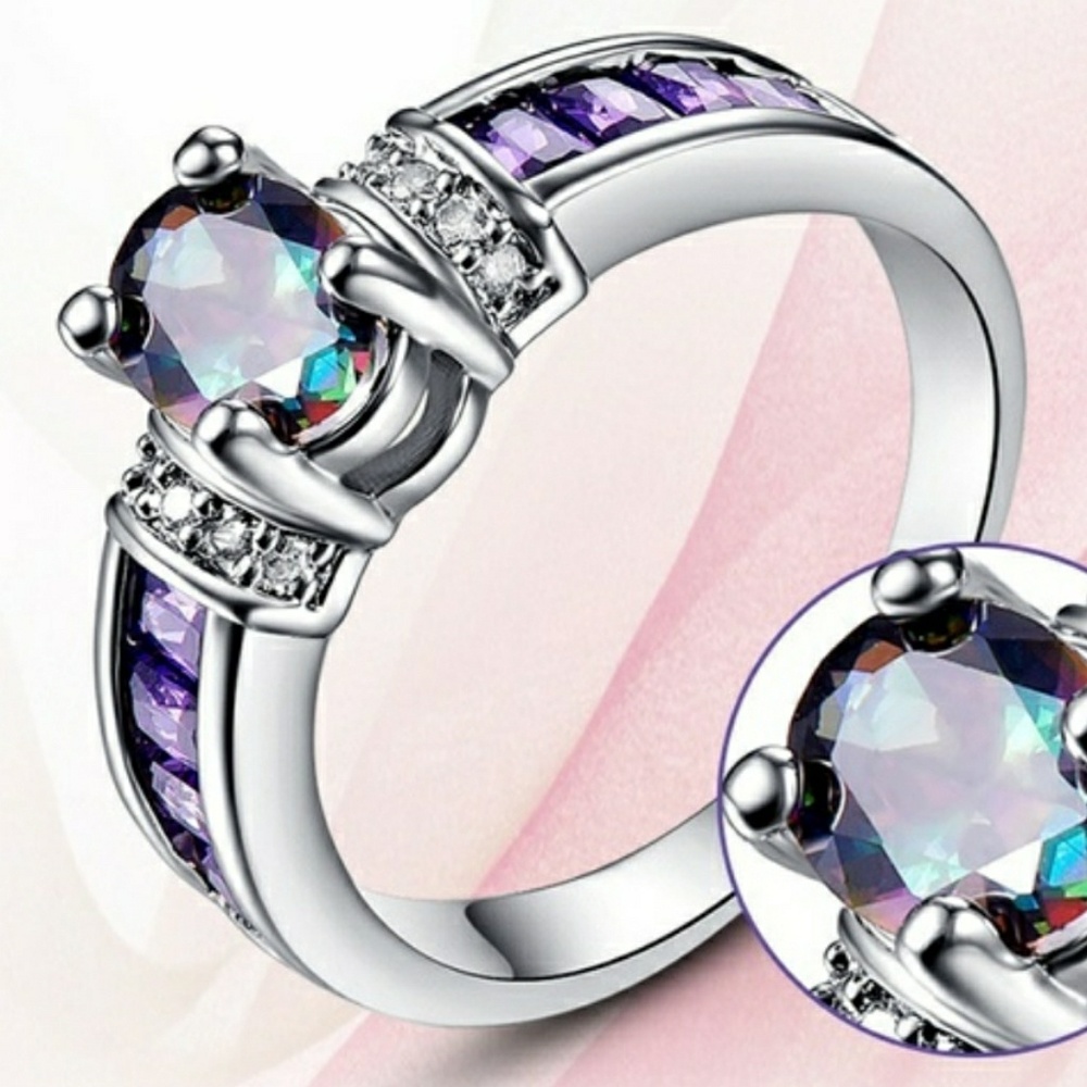 Size 8 , 18 k white gold plated ring