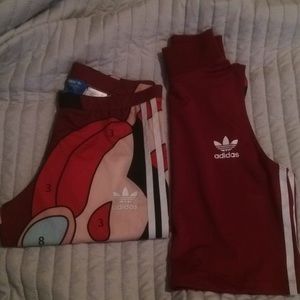 Rita Ora Adidas; leggings and cropped mock neck