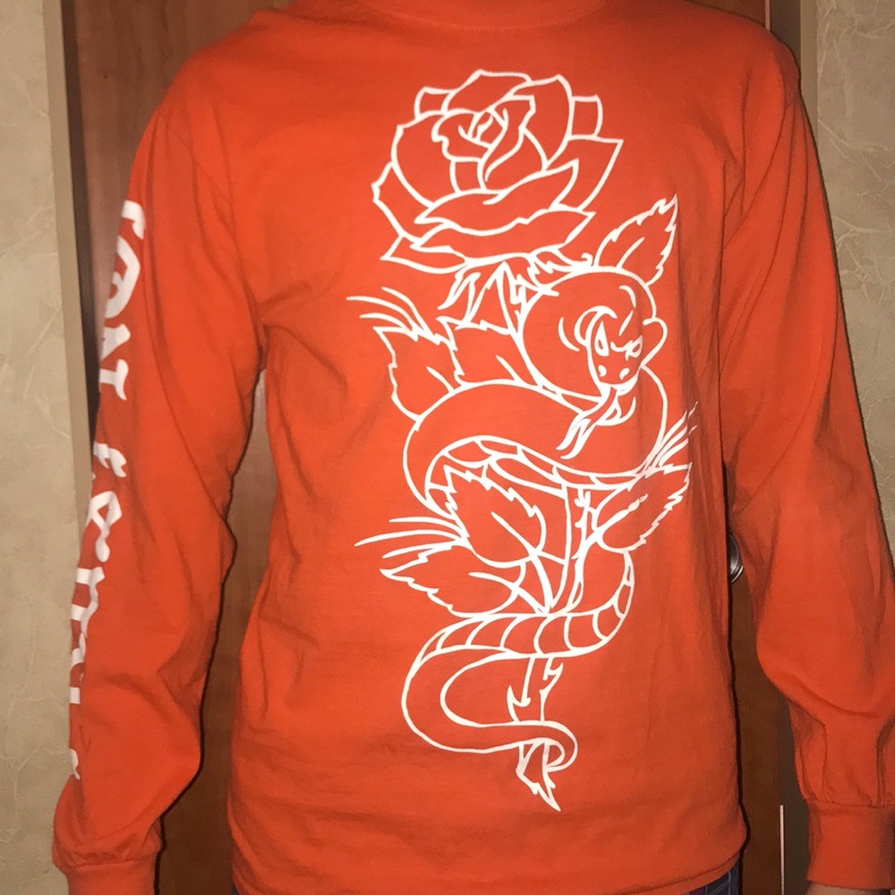 orange long sleeve graphic tee