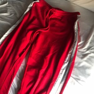 Red track pant with side stripe