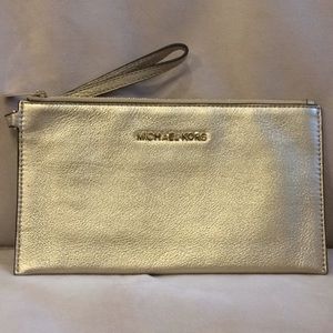 Michael Kors Mercer Large Zip Clutch in Pale Gold