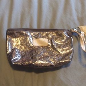 Sorial clutch wristlet
