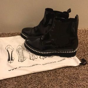 Black combat boots with pearls