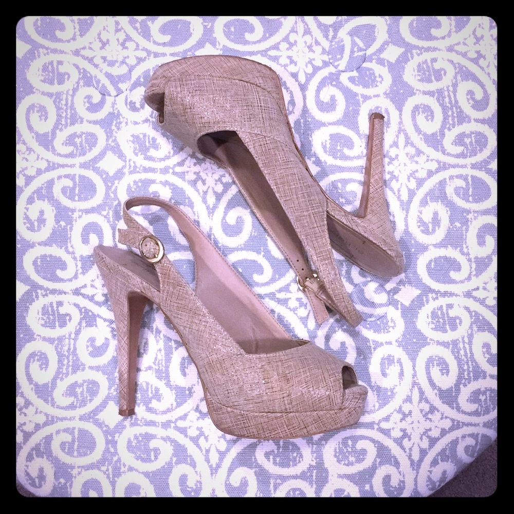 Nude peep toe pumps