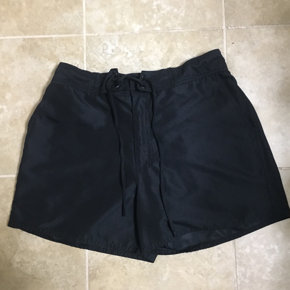 Black board shorts