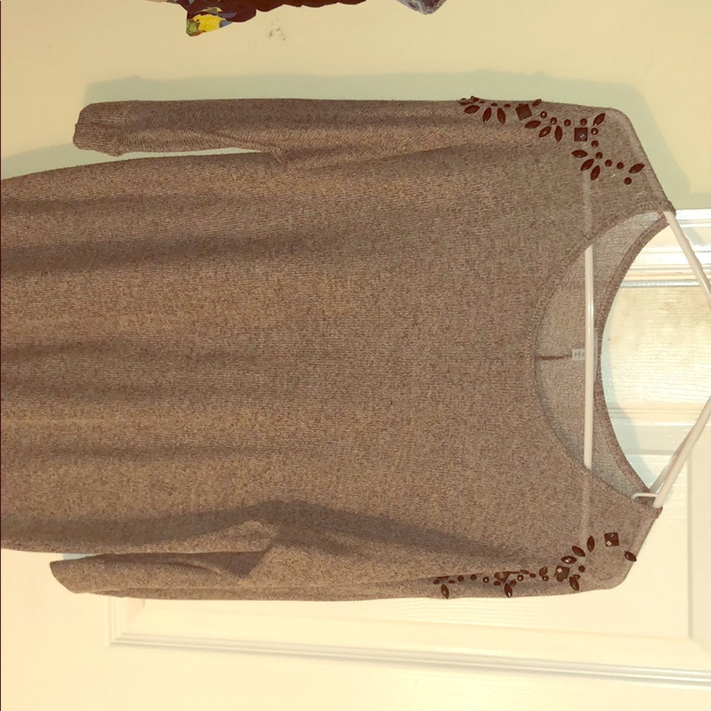 Quarter length grey top with jeweled sleeves!