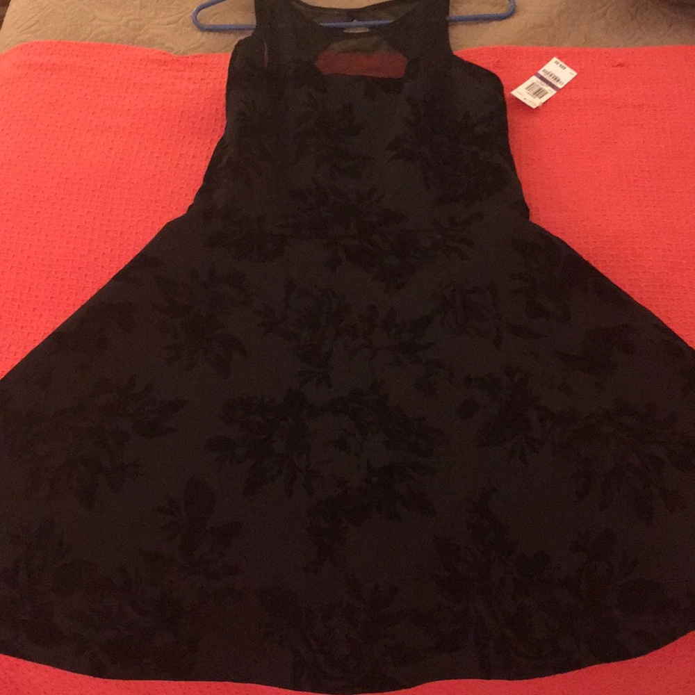 Black gorgeous dress!New with tags! Get it ladies!
