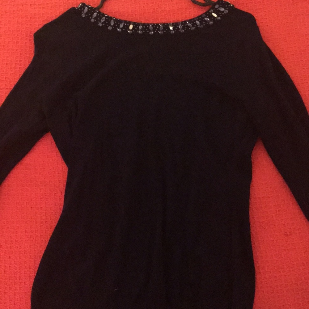 Navy blue long sleeve sweater with neck accents